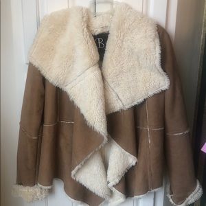 Lt Brown Faux suede with shearling lining.